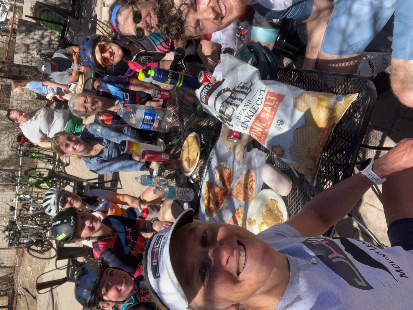 Post-ride pizza stop with the team at camp