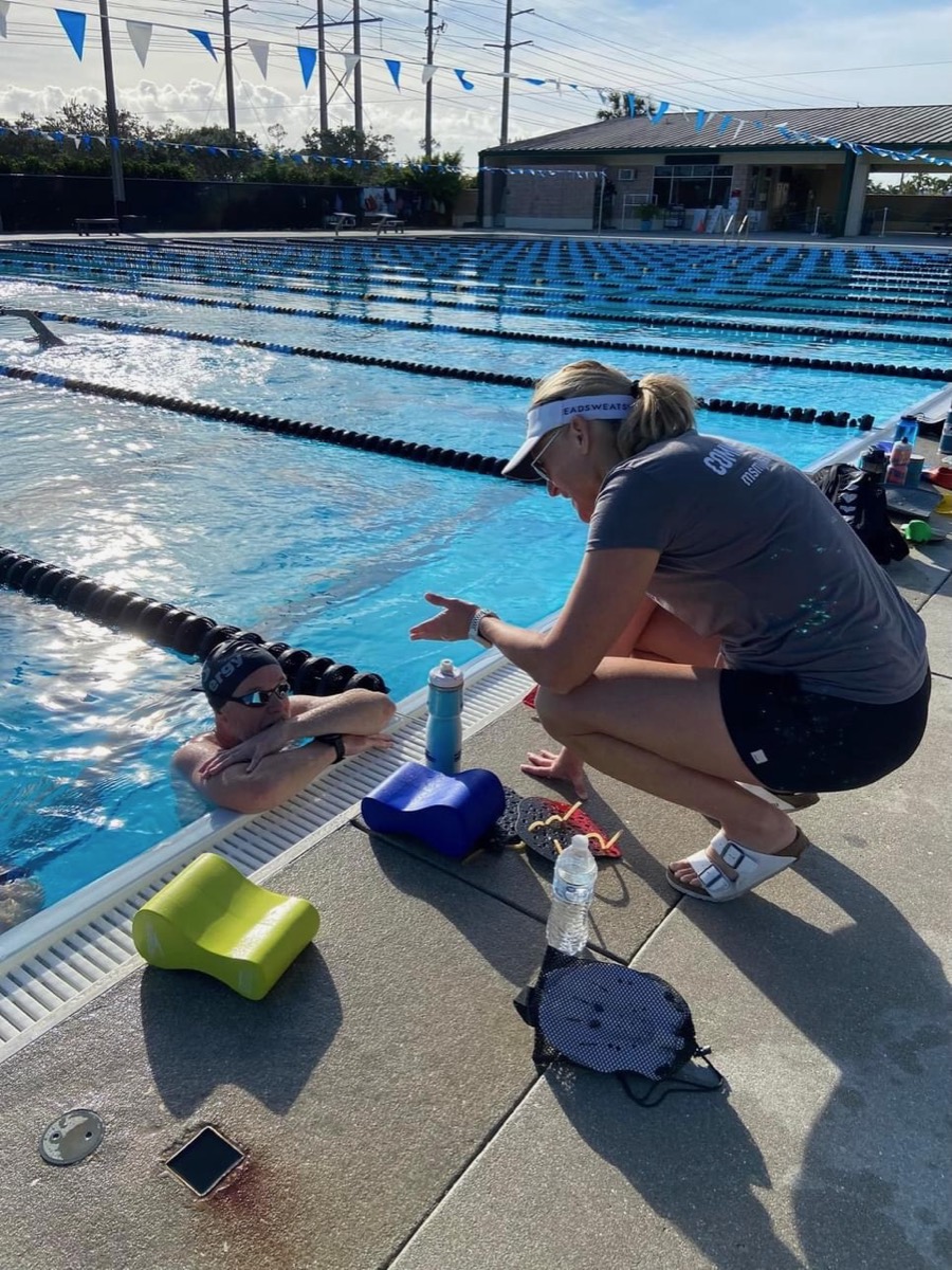 Jen coaching an athlete during a session