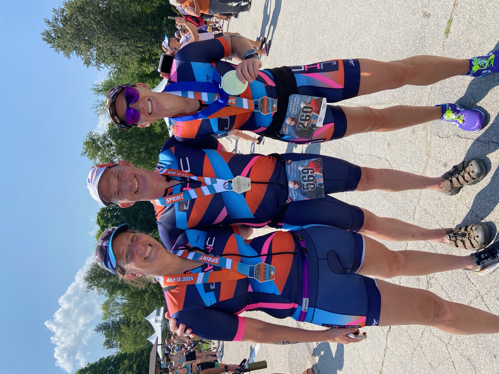 JHC athletes celebrating with finisher medals