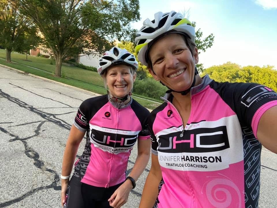 Jen Harrison and a JHC athlete on a bike ride in JHC kit